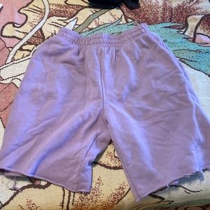 purple shorts with raw edge hem